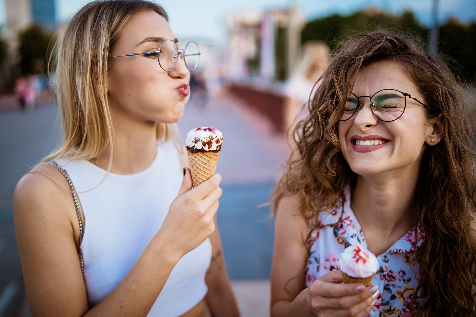 Girls Wearing Stylish Frames And Eating Icecream